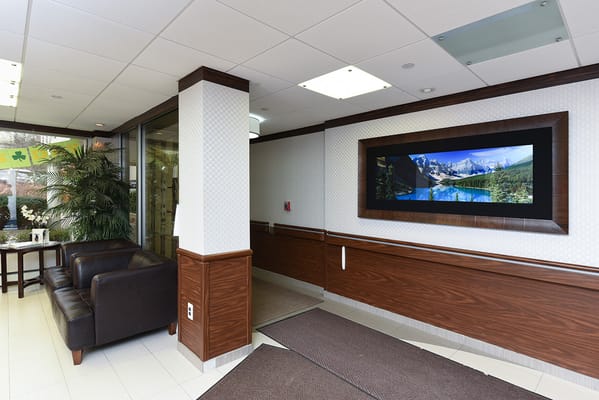 Bright lobby area with seating and artwork