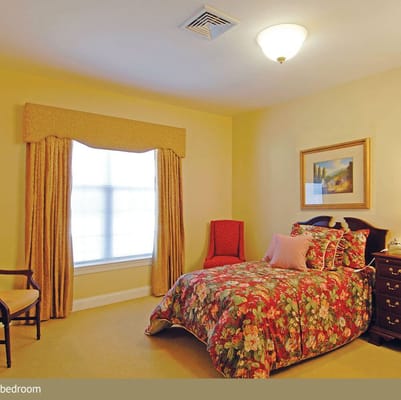 Cozy interior of a private resident room with floral decor