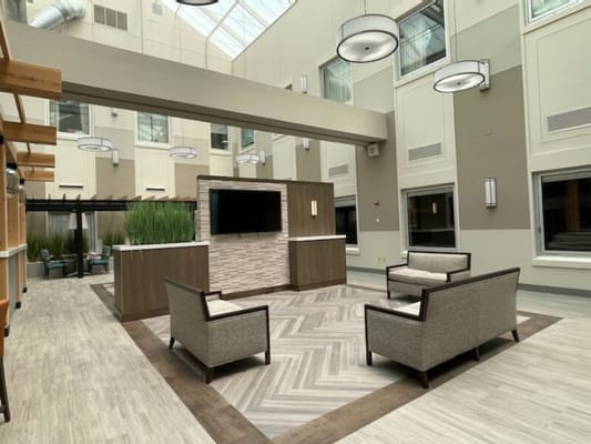 Bright common area with modern furnishings and natural light