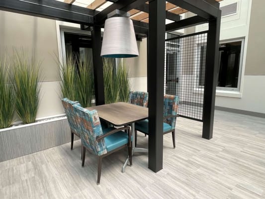 Interior seating area with colorful chairs