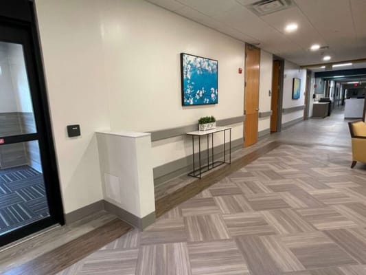Interior hallway with decor and seating area