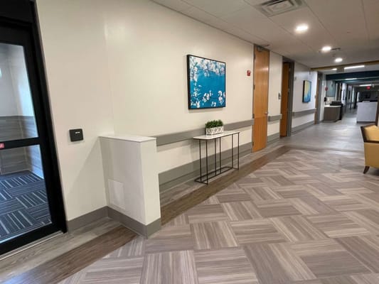 Interior hallway with decor and seating area