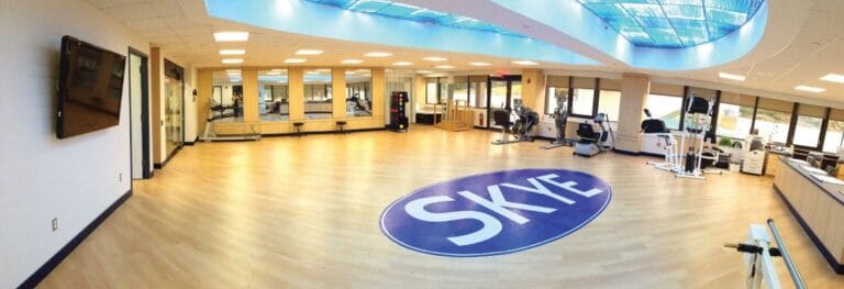 Interior view of a fitness area with exercise equipment