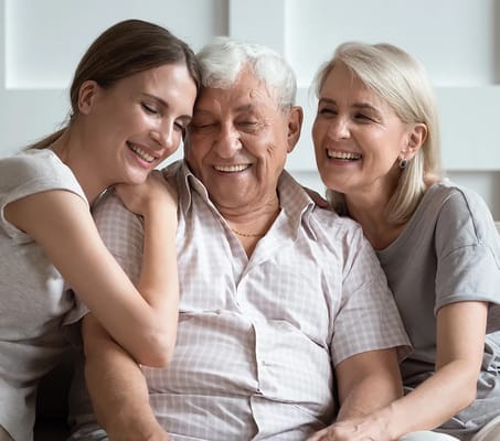 Three residents enjoying time together and laughing