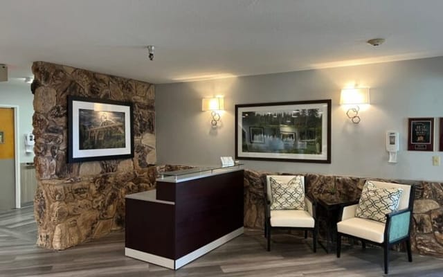 Interior view of a nursing home lobby with seating