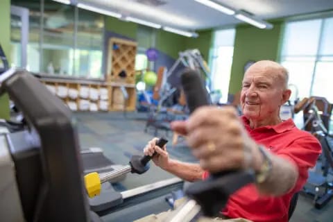Senior man exercising in a fitness area