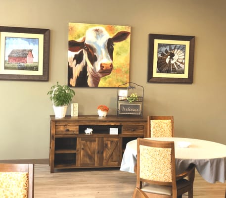 Cozy common area with artwork and furniture