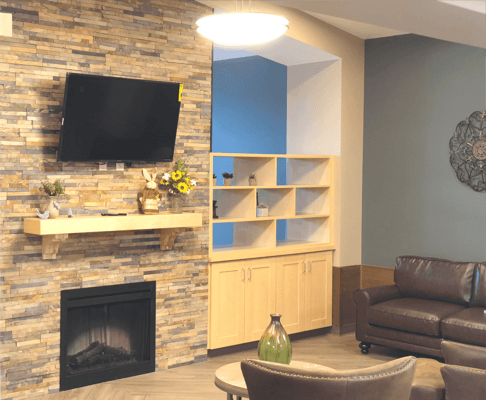 Cozy common area with fireplace and seating