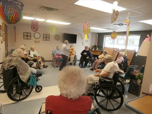 Residents participating in an indoor activity session