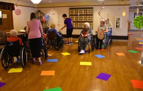 Residents enjoying a festive activity in a common area
