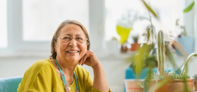 Smiling senior woman in a cozy indoor setting
