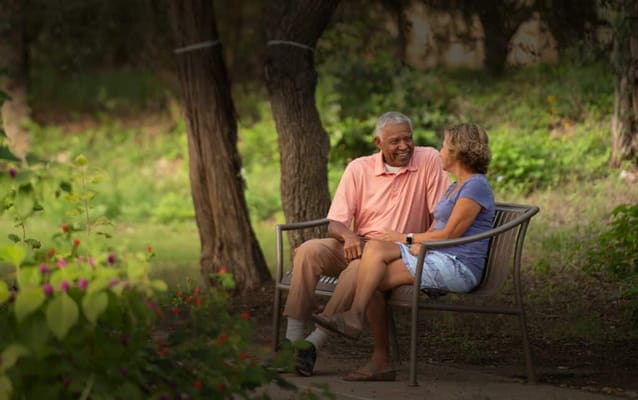 Couple enjoying each other’s company in a garden