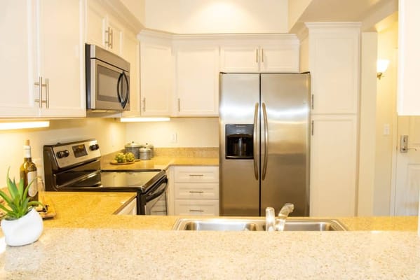 Modern kitchen interior with stainless steel appliances