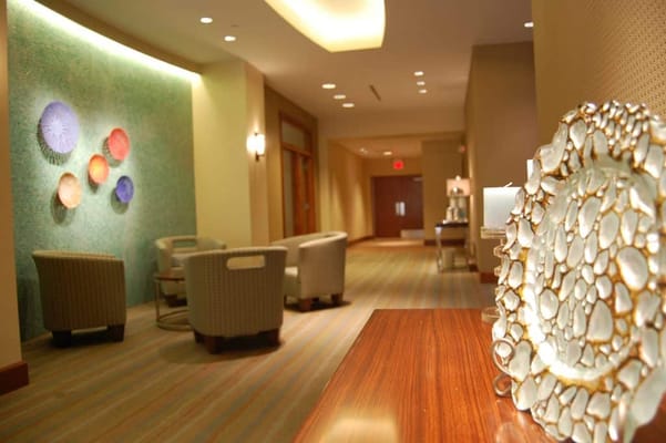 Bright and modern hallway with decorative wall