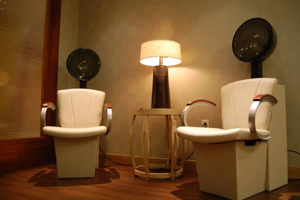 Hair salon chairs and lamp in a cozy room