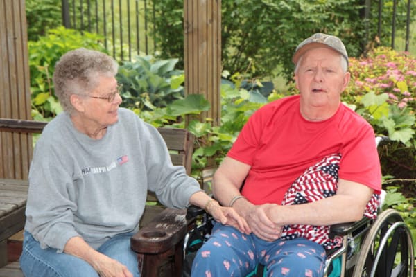 Residents enjoying time together in a garden area