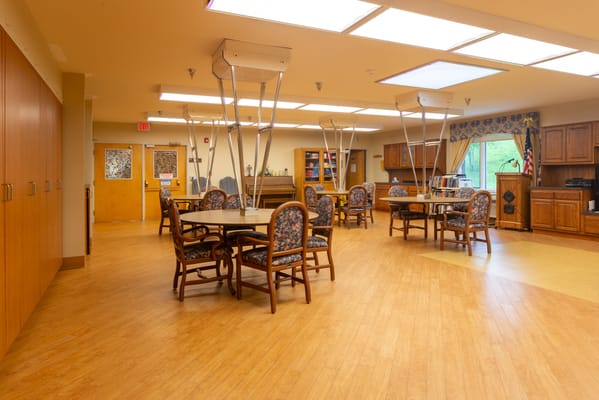 Bright common area with tables and chairs