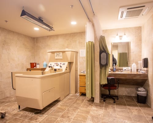 Interior view of a therapy room with equipment
