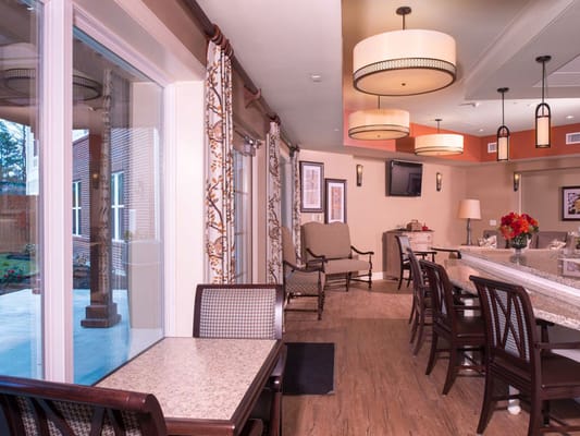 Interior view of a cozy common area with seating