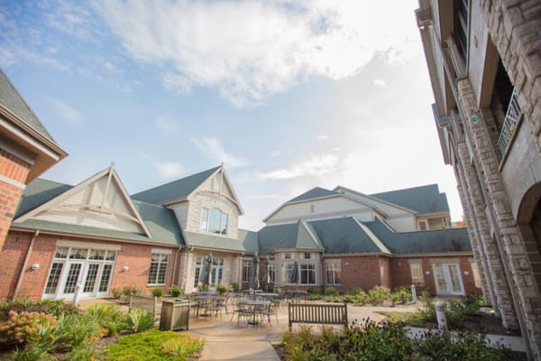 Courtyard of a senior living facility with outdoor seating