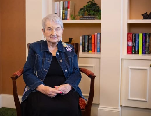 Senior woman sitting in a cozy lounge