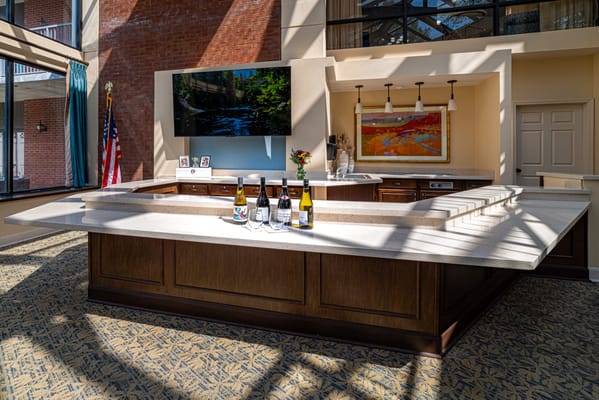 Interior view of a common area with a bar setup