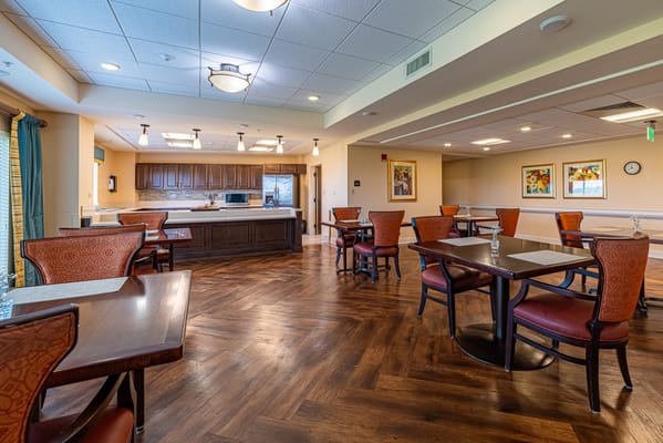 Bright dining room with tables and chairs