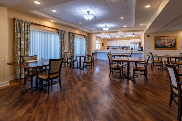 Bright dining room with tables and chairs