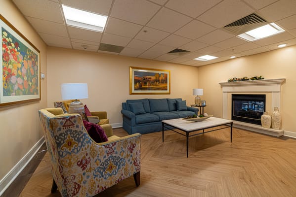 Cozy common area with comfortable seating and fireplace