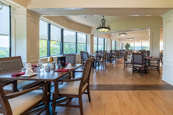 Bright dining room with tables and chairs