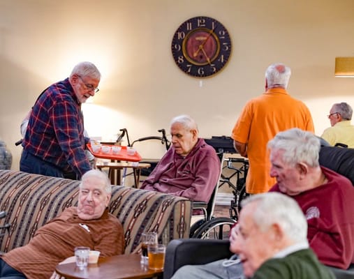 Residents engaging in conversation in a common area