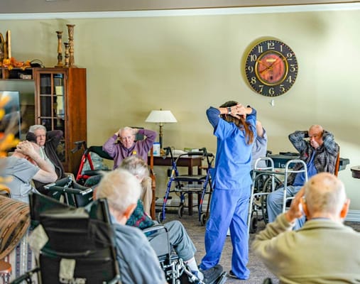 Residents participating in a group exercise activity