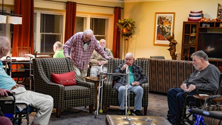 Residents interacting in a cozy common area