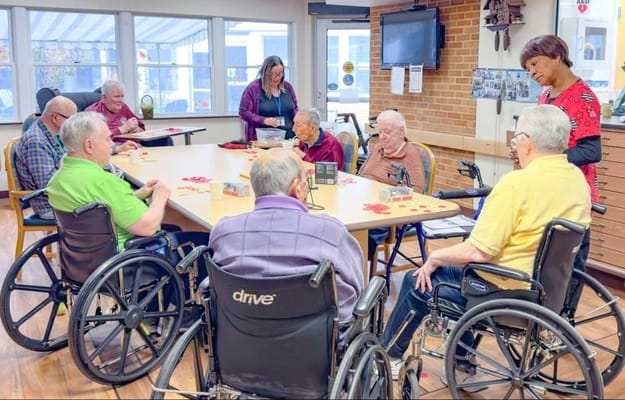 Residents engaging in a group activity in a common area