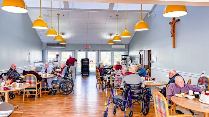 Residents enjoying meals in the dining room