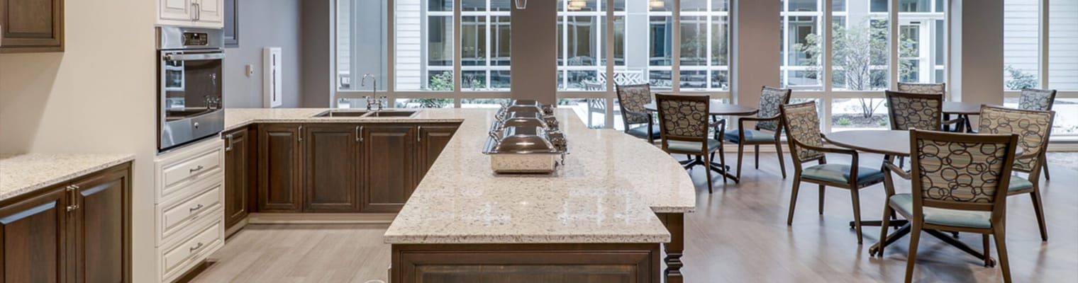 Spacious dining area with natural light and elegant decor