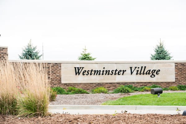 Sign for Westminster Village at the facility entrance