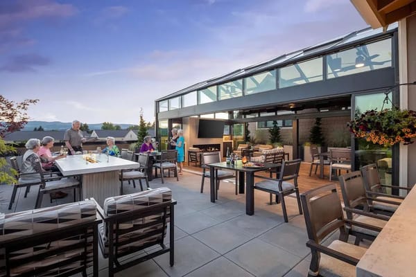 Residents enjoying time on a rooftop terrace