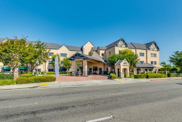 Exterior view of a senior living facility with entrance