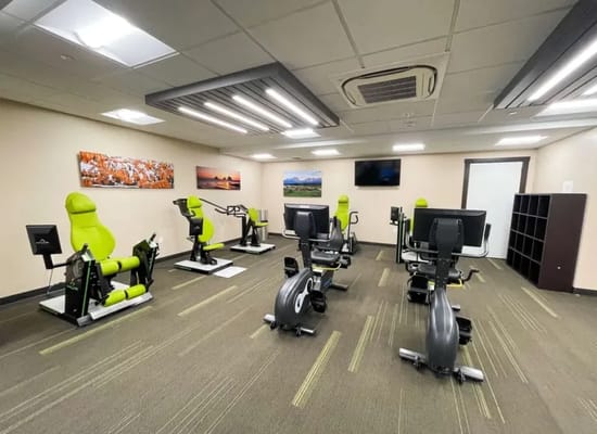 Interior view of a fitness room with exercise equipment