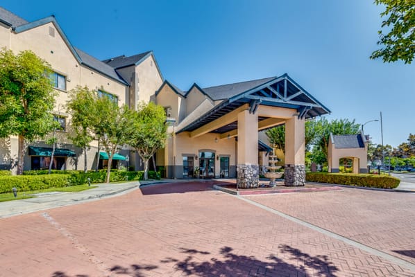 Exterior view of a senior living facility entrance