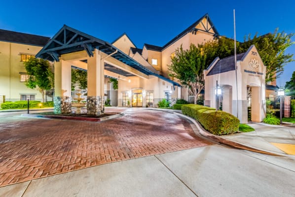 Entrance of a senior living facility with covered driveway