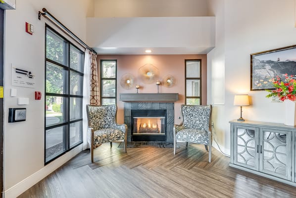 Interior view of a cozy common area with seating