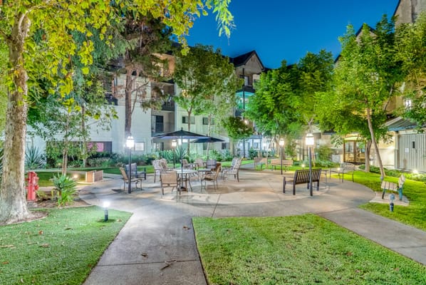 Outdoor garden area with seating and landscaping