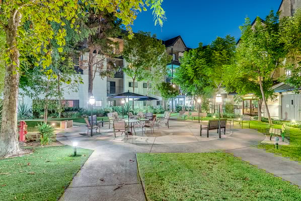 Outdoor garden area with seating and landscaping