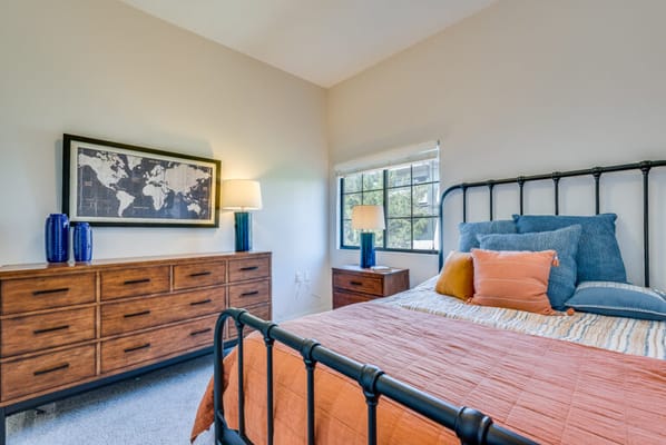 Cozy bedroom with modern decor and a warm color scheme