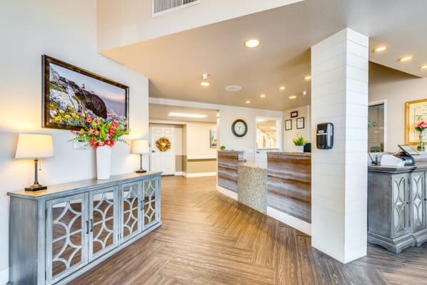 Bright interior lobby with a reception area