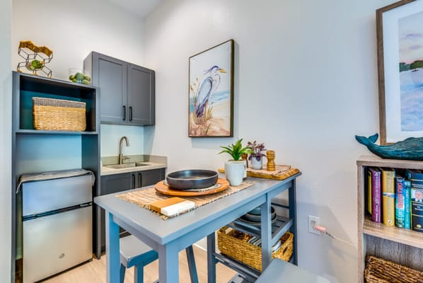 Well-lit kitchenette area with modern decor