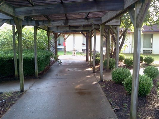 Covered walkway leading to building entrances