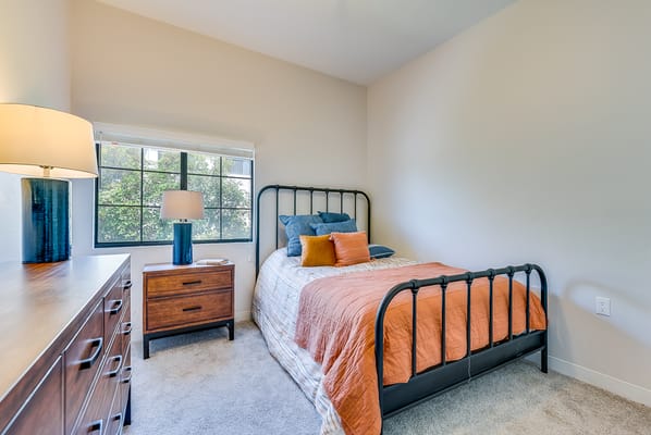 Cozy assisted living bedroom with natural light